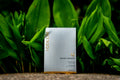 GM Collin Radiance Eye Patches on dark green leafy background