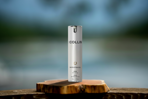 GM Collin Phyto Stem Cell Cream on a wooden surface with a blurred natural background