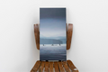 Fiona Dalrymple painting, "Generations", sitting on a wooden painter's chair, with white background.